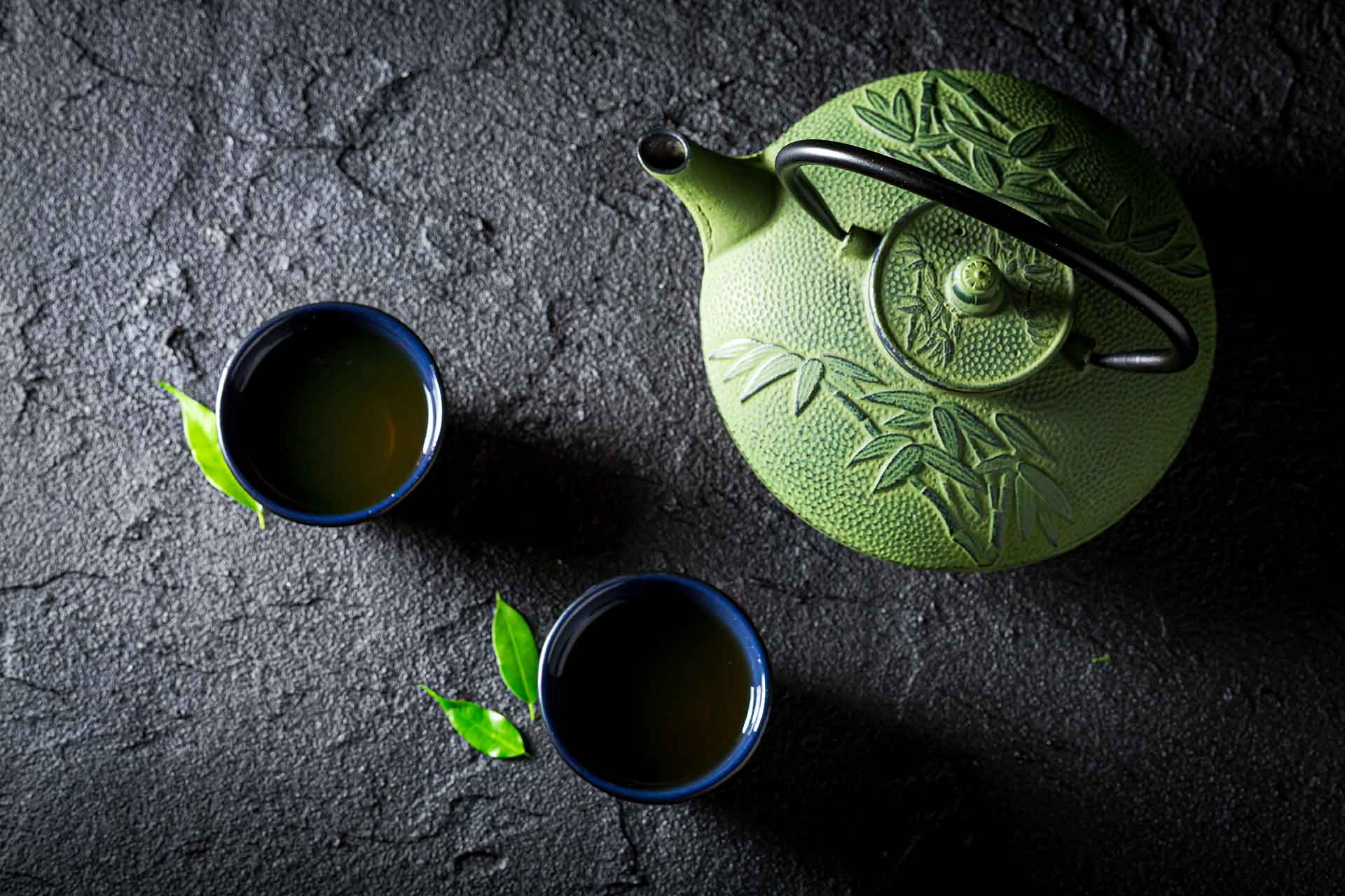 aromatic green tea on black rock