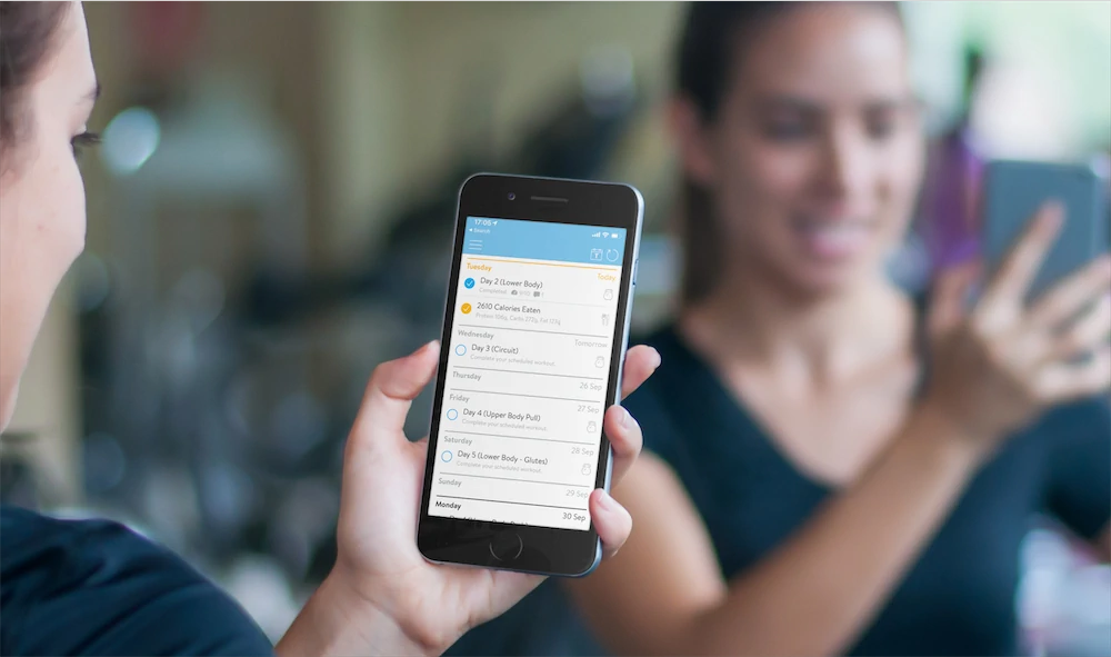 Women using the Absofitly fitness app